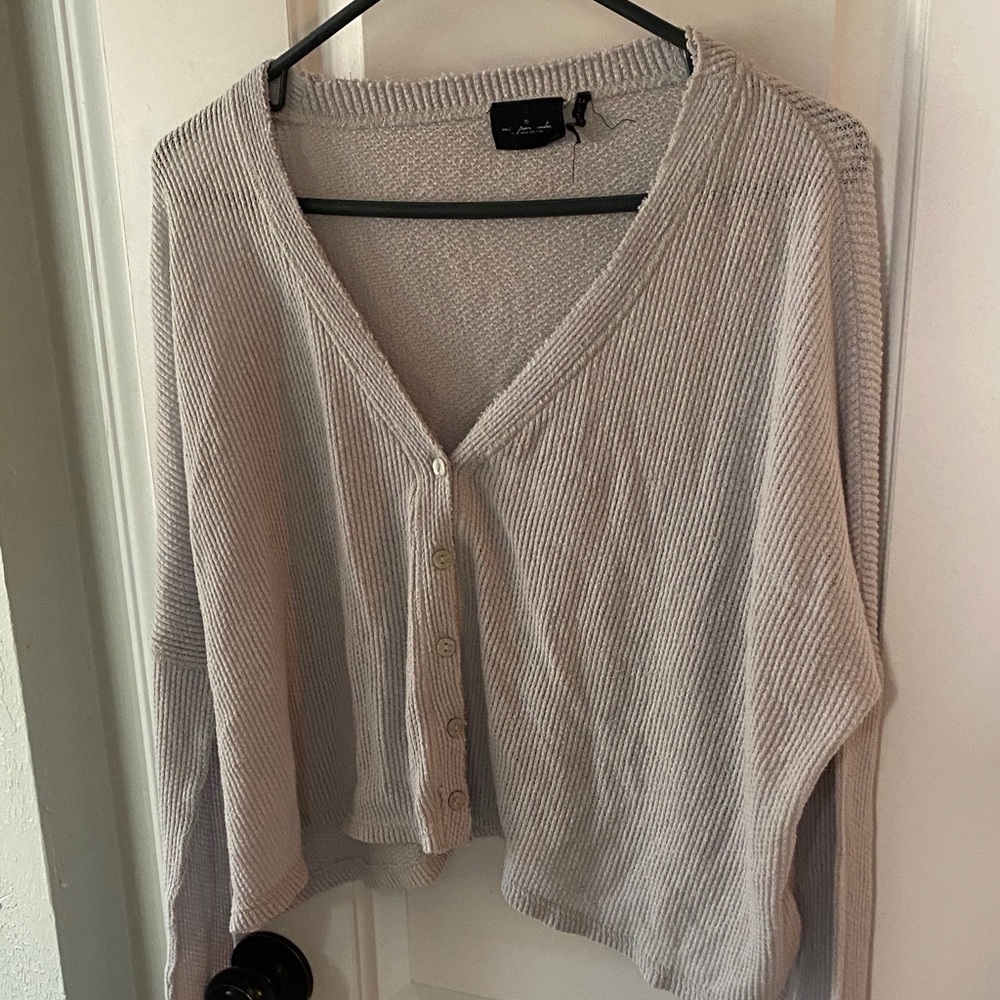 out from i dr sweater